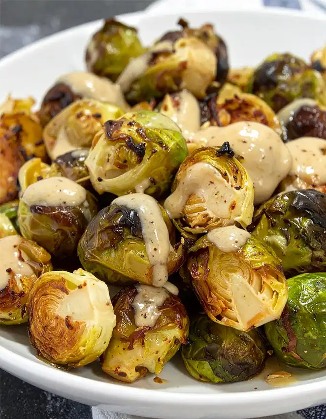 Roasted Brussels Sprouts, coated with Dijon maple butter sauce