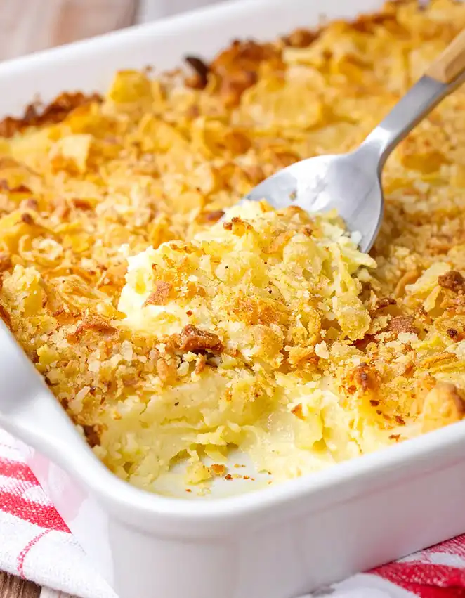 Cheesy Potato Casserole with golden brown crushed cornflakes on top