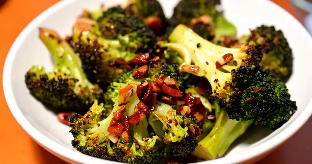 Roasted Broccoli florets, topped with chopped Pecans