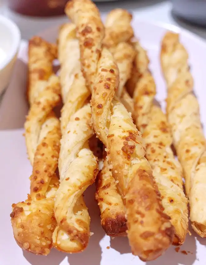 Buttery, flaky, cheesy puff pastry cheese straws