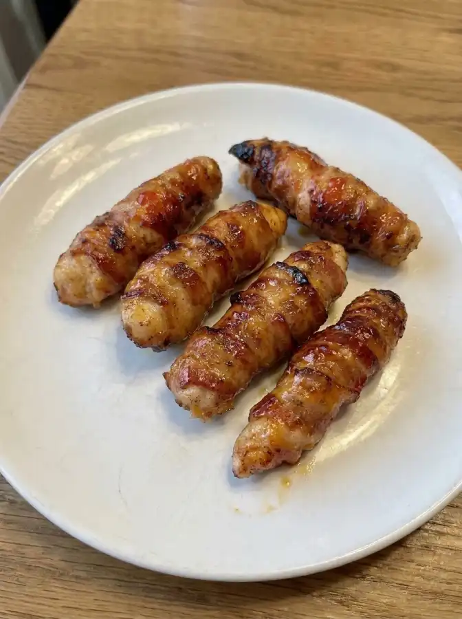 A plate of Bacon Wrapped Chicken Tenders
