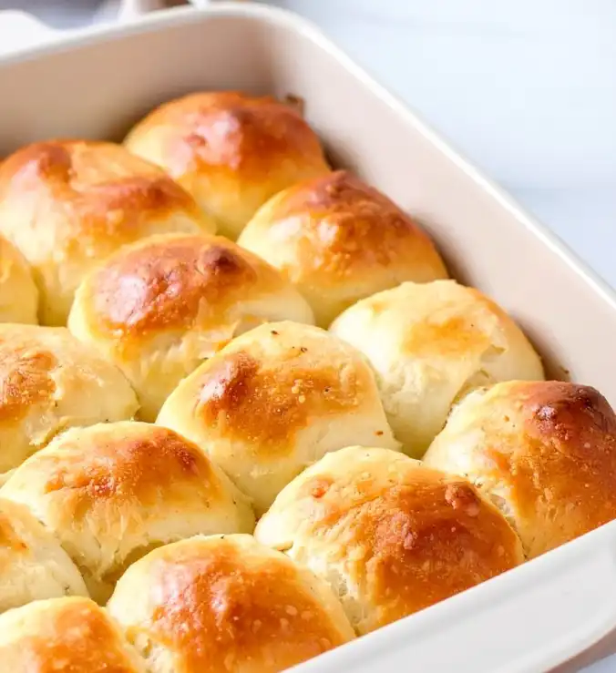 Fluffy dinner rolls in a baking dish
